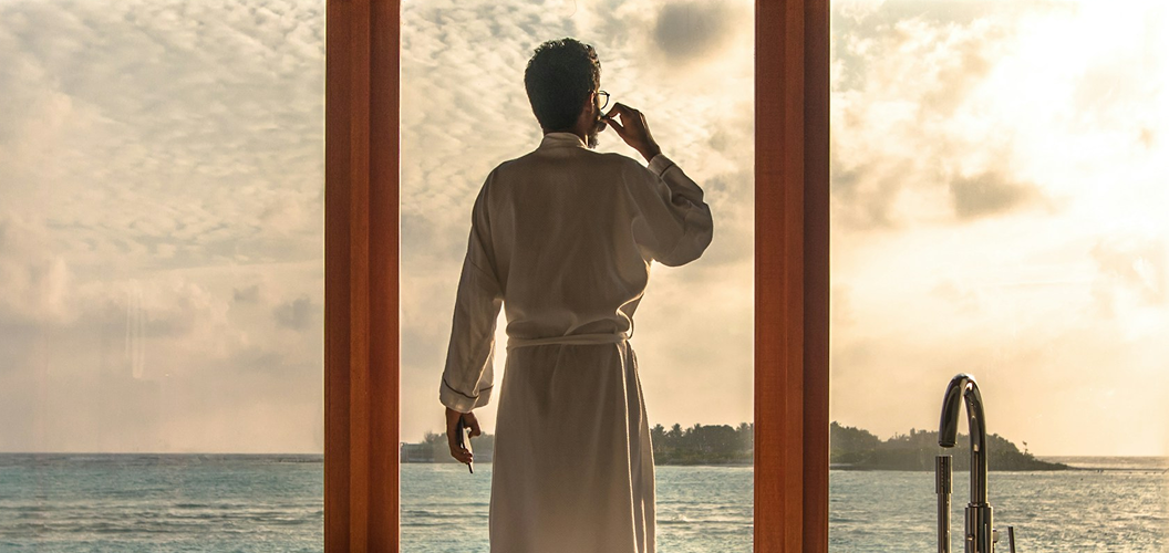 Privilege Club member by the window